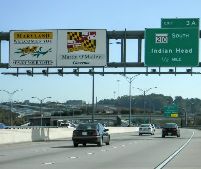 A sign on I-95 north welcome drivers coming from Virginia to Maryland and advertises the name of the governor. (Photo: Max Bennett)