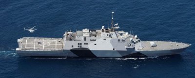 PACIFIC OCEAN—An MQ-8B Fire Scout unmanned helicopter assigned to Helicopter Maritime Strike Squadron (HSM) 35 takes off from the littoral combat ship USS Freedom (LCS 1) during visit, board, search and seizure training off the coast of southern California. Navy systems safety practitioner Rebecca Funkhouser—a scientist working with a team dedicated to reducing operational risk for Sailors aboard ships, including the Freedom—received the Secretary of the Navy Safety Excellence Award at a Pentagon ceremony Oct. 20. Funkhouser and senior safety engineer Robert Heflin accepted the award on behalf of their Naval Surface Warfare Center Dahlgren Division colleagues who are dedicated to providing Sailors with the safest possible shipboard environment.