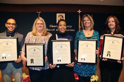 Pictured are Charles County Public Schools employees honored by the Board of Education Dec. 9. Pictured from left are: Timothy Remo, Carrie Lamb, Camille Calloway, Patricia Hodson and Bonnie Jenkins.