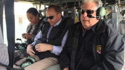 From left, Gov. Larry Hogan in a National Guard helicopter with his public affairs director Steve Crim and Adjutant General Linda Singh. (From Larry Hogan Facebook page)