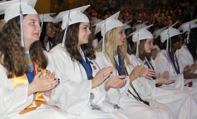 Members of La Plata High School’s Class of 2015 give applause for their valedictorian, Ciara Albrittain, after her speech during their graduation ceremony held May 29 in the Convocation Center at North Point High School. La Plata’s graduation was the first of six high school ceremonies planned for May 29-30.