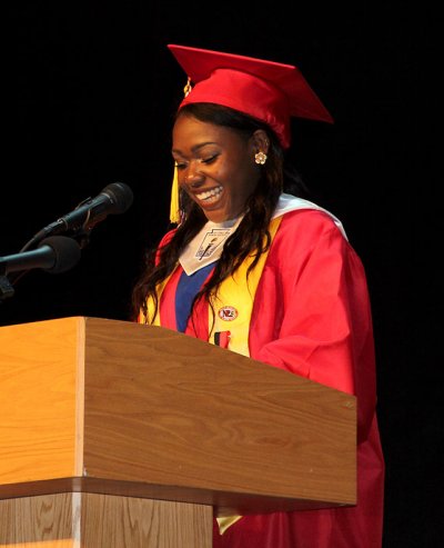 North Point High School class president Nakira Christmas addresses her peers as part of North Point's graduation ceremony held May 30 at the school. North Point's Class of 2015 earned more than $18 million in scholarships, the highest total for a graduating class from the school since it opened in 2005.