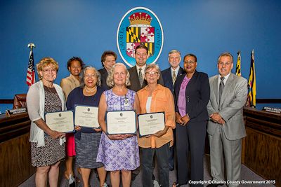 Pictured, left to right: Karen Smith Hupp (College of Southern Maryland); Commissioner Amanda M. Stewart, M.Ed. (District 3); Dr. Dianna Abney (Charles County Department of Health); Commissioner Vice President Ken Robinson (District 1); Julie Simpson (Port Tobacco River Conservancy); Brendan Moon (Charles County Board of Appeals); Nancy Schertler; Commissioner President Peter F. Murphy ; Commissioner Debra M. Davis, Esq. (District 2); and Commissioner Bobby Rucci (District 4).