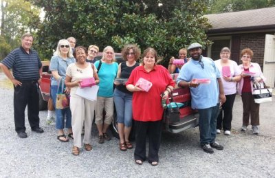 CCAA's Volunteers with the 400 boxes ready to be delivered to the Children's Aid Society.