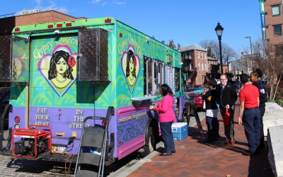 A crowd of customers waits for their food at the Gypsy Queen Cafe in Fells Point. (Photo: Sissi Cao)