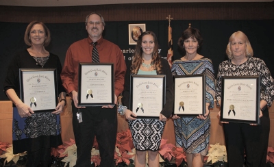 The Board of Education honored five Charles County Public Schools employees Dec. 8 for their commitment to teaching and learning. Pictured, from left, are: Pauline Johnson, vice principal, Henry E. Lackey High School; Dan Meltsner, technology education teacher, John Hanson Middle School; Ashley Valenzuela, first-grade teacher, T.C. Martin Elementary School; Rebecca Irwin, second-grade teacher, Dr. Gustavus Brown Elementary School; and Luanne Cochran, instructional resource teacher, C. Paul Barnhart Elementary School.