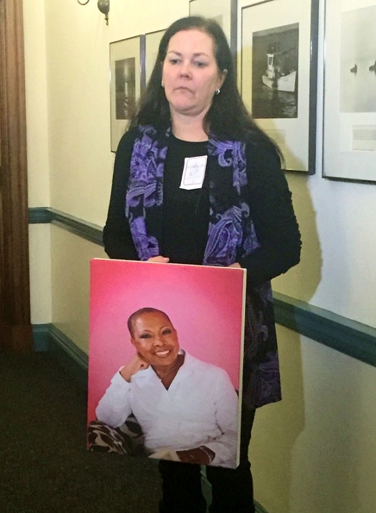 Kelley Lange with a portrait of Marlene King. (Photo: MarylandReporter.com)