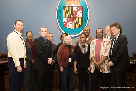 Pictured, left to right: Nick Vitielliss, parks sports program coordinator; Commissioner Vice President Debra M. Davis, Esq. (District 2); Austin Flowers, recreation sports program supervisor; Commissioner Bobby Rucci; Commissioner Amanda M. Stewart, M.Ed. (District 3); Sally Bahen, recreation multi-center coordinator; Leah Johnson, youth player; Terry Sellers, coach; Michael Gomes, administrator; Commissioner President Peter F. Murphy; and Commissioner Ken Robinson (District 1). Not pictured: Maria Quarles, coach.