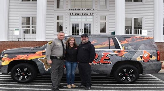 Pictured from left to right is Sheriff Mike Evans, Misty & Ritchie Gibson, owners of Tint Works Plus.