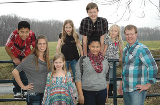 Front Row from Left to Right: Emily, Selah, T’aunie, and Jeff Weimert. Back Row from Left to Right: Byron, Trinity, Josiah, and Avigail Weimert. (Photo: Jeff Weimert)