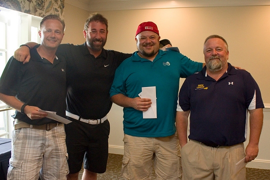 Pictured: Steve Combs LSM'14, Richie Piniewski, Dave Bean, and Joe Lockman, first place overall. (Photo: Blue Hazel Studios)
