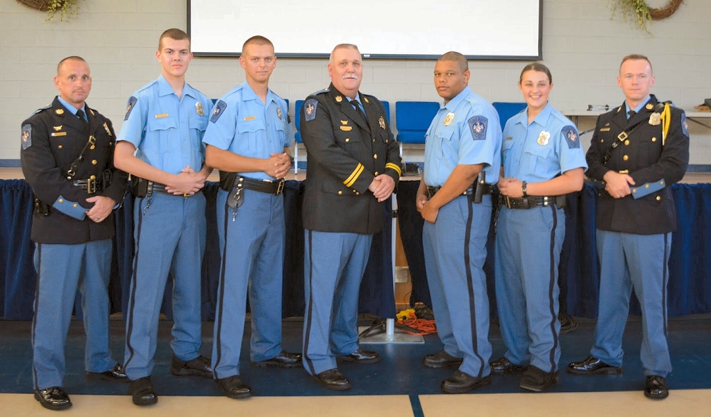 Cpl. M. Licausi, Alexander G. Tasciotti, Rainer W. Hersh, Captain Michael R. Merican, Dale I. Wade, Briana I. Edelen, and CFC B. Luffey.