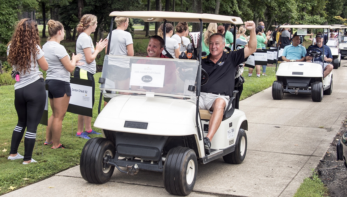 College of Southern Maryland students cheer on the golfers as they make their way onto the course at Swan Point Yacht & Country Club on Aug. 18. The 25th Annual Golf Classic raised more than $73,000 to support CSM Foundation scholarships for credit and non-credit workforce development programs.