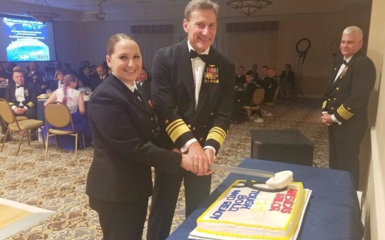 Vice Adm. Paul Grosklags, commander, NAVAIR, and Seaman Emilley Taback topped off the night at the NAS Pax River 241st Navy Birthday Ball with the traditional birthday cake cutting. (U.S. Navy photo by Marcia Hart)