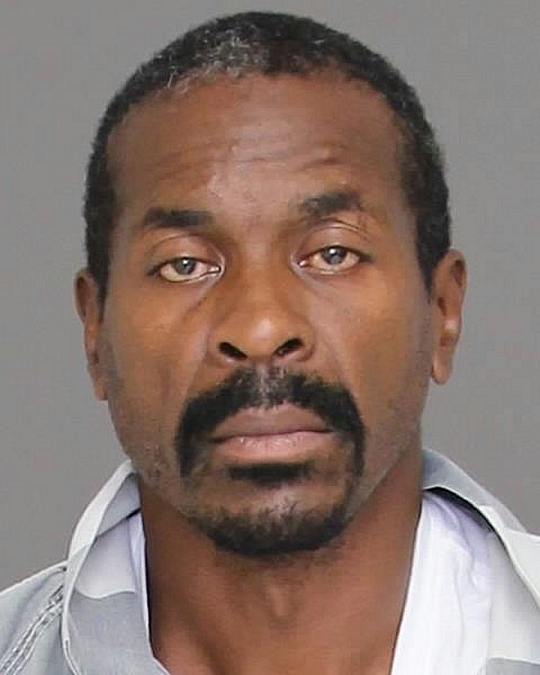 Howard Bernard Dent, 49, of Temple Hills. Booking photo via ChasCoSO.