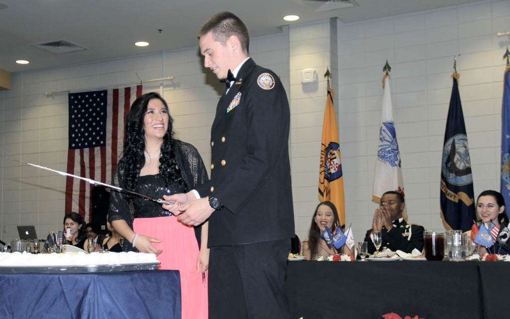 Charles County Public Schools hosted the 10th annual Col. Donald M. Wade Joint Services Military Ball on Friday, Dec. 9 at North Point High School. The event is held to honor senior cadets enrolled in the school system's JROTC programs and features several military traditions, such as a cake cutting. Cadet Ana Chavez, left, of Maurice J. McDonough High School was chosen to cut the cake and was joined by La Plata High School's Kenneth Dutton.