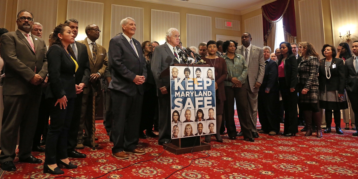 Maryland Senate President Mike Miller, center, is surrounded by Democratic legislators and supporters in the Senate building in Annapolis, Md., on January 31, 2017.  They gathered to discuss the Democratic party positions in response to the Trump administration’s actions, as well as the impact some of the Trump administration regulations would have on Marylanders. (Photo: Hannah Klarner)