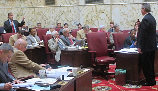 Sen. Jim Brochin, standing left, questions Sen. Mac Middleton, standing right, about the paid sick leave bill he brought to the floor. (Photo: MarylandReporter.com)