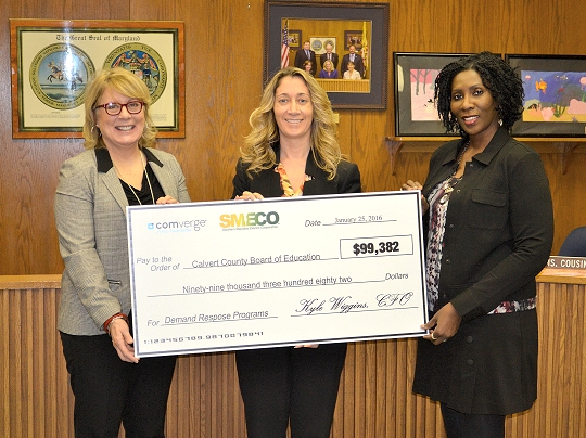 SMECO and Comverge/CPower presents Calvert County public schools with a check for $99,382 for participating in the Demand Response program. Pictured from left are Suzanne Levine, CPower account manager, Jennifer Raley, SMECO energy and technology programs manager for demand-side management, and Pamela Cousins, president of the Calvert County Board of Education.