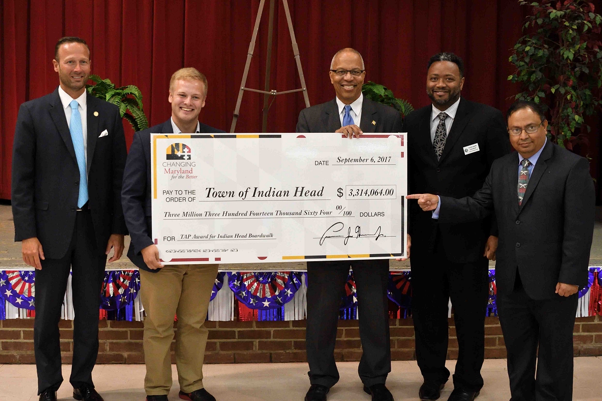 Lt. Governor Boyd K. Rutherford (third from right) today presented a $3.3 million ceremonial check to Indian Head Mayor Brandon Paulin (second from left) and representatives of the county and state delegations to begin a project in Southern Maryland to expand access to the Potomac River.