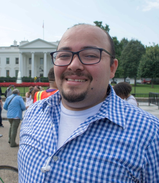 Jose Aguiluz, 28, was one of several hundred people gathered outside the White House awaiting the administration’s decision on Tuesday, Sept. 5th. (Photo by Helen Parshall)