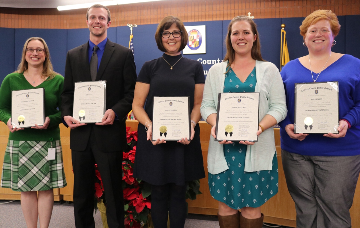 The Board of Education at its Dec. 12 meeting honored five exemplary Charles County Public Schools (CCPS) employees. Those honored were recognized for their dedication and commitment to teaching and learning, and for making a difference in the lives of students. Honored, from left, were Annemarie Simpson, mathematics teacher, Maurice J. McDonough High School; Peter Wilt, social studies teacher, Milton M. Somers Middle School; Karen Ferruza, library media specialist, Arthur Middleton Elementary School; Samantha Clark, special education teacher, Mary H. Matula Elementary School; and Ann Herbert, prekindergarten teacher, Gale-Bailey Elementary School.