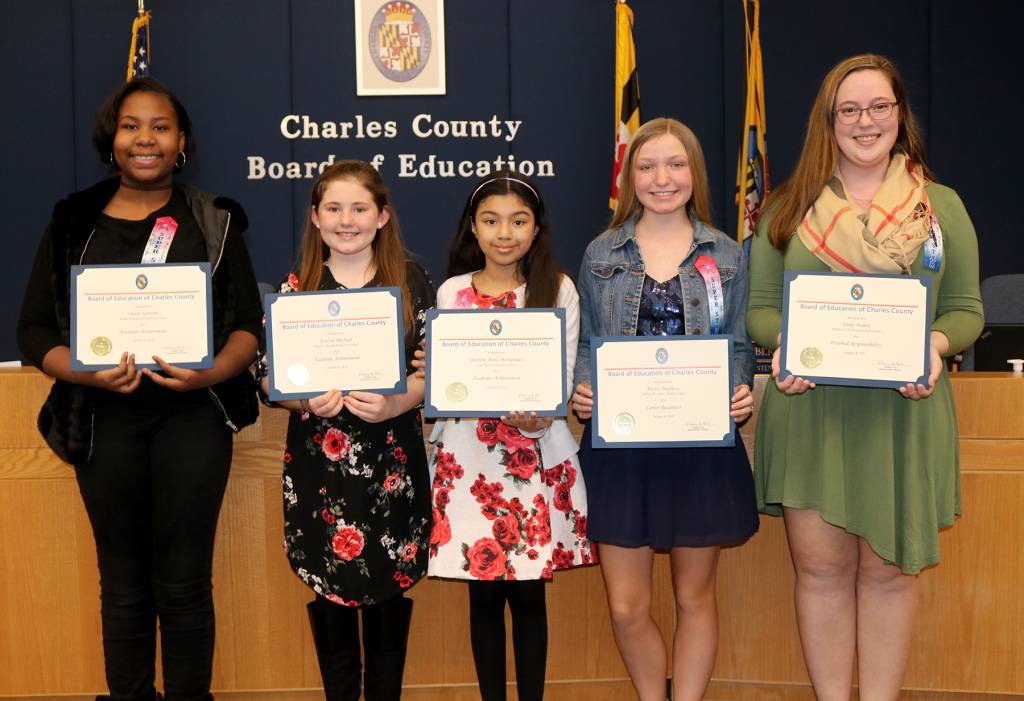 The Board of Education at its Jan. 8 meeting recognized five Charles County Public Schools (CCPS) students for accomplishments in the areas of academic achievement, career readiness and personal responsibility. Honored were, from left, Imani Spencer, fifth grader at Arthur Middleton Elementary School; Evelyn Michael, fifth grader at Mary H. Matula Elementary School; Sherline Avila-Hernandez, fifth grader at Gale-Bailey Elementary School; Trinity Treadway, eighth grader at Milton M. Somers Middle School; and Emily Maljak, senior at Maurice J. McDonough High School. The Board at its monthly meetings honors CCPS students and staff who are nominated by their principals for recognition.
