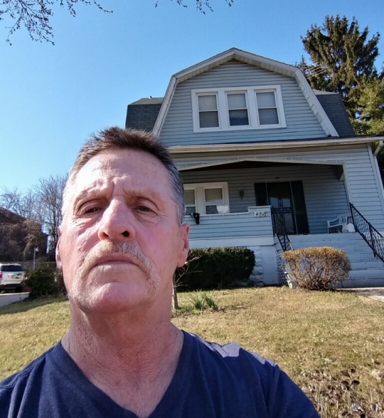 Raymond Thompson, pictured in front of his Baltimore City residence, was once at risk of losing his home to the upcoming tax sale due to lost paperwork. (Photo Credit: Raymond Thompson)