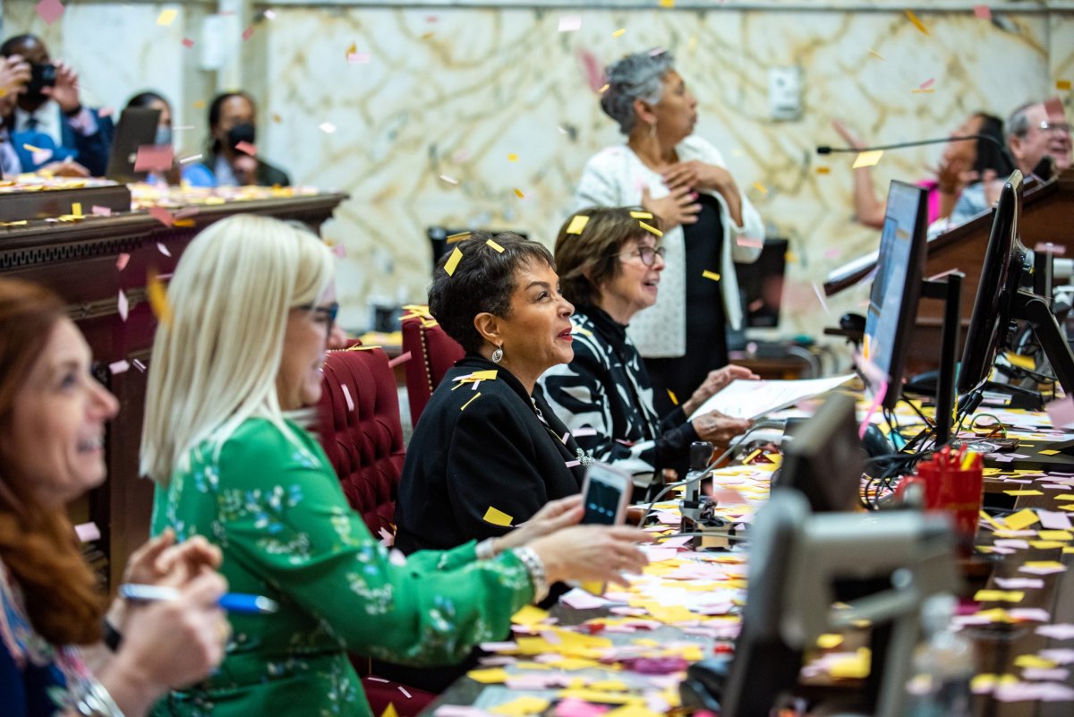 Senate clerks watch confetti rain down around them as the Maryland General Assembly legislative session ends just before the clock strikes midnight. (Photo: Joe Ryan)