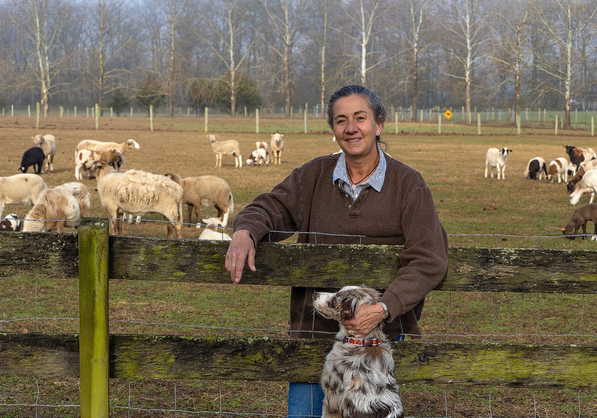 Darlene Goehringer with her 6-month-old Australian shepherd at Pops Old Place, near Preston, MD. (Bay Journal photo by Dave Harp)