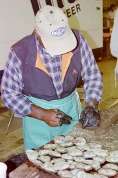 A tray of oysters on the half shell just about ready for sale to the public.